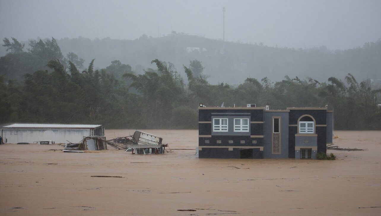1,000 rescued as Hurricane Fiona cripples Puerto Rico with flooding and power outages before slamming the Dominican Republic